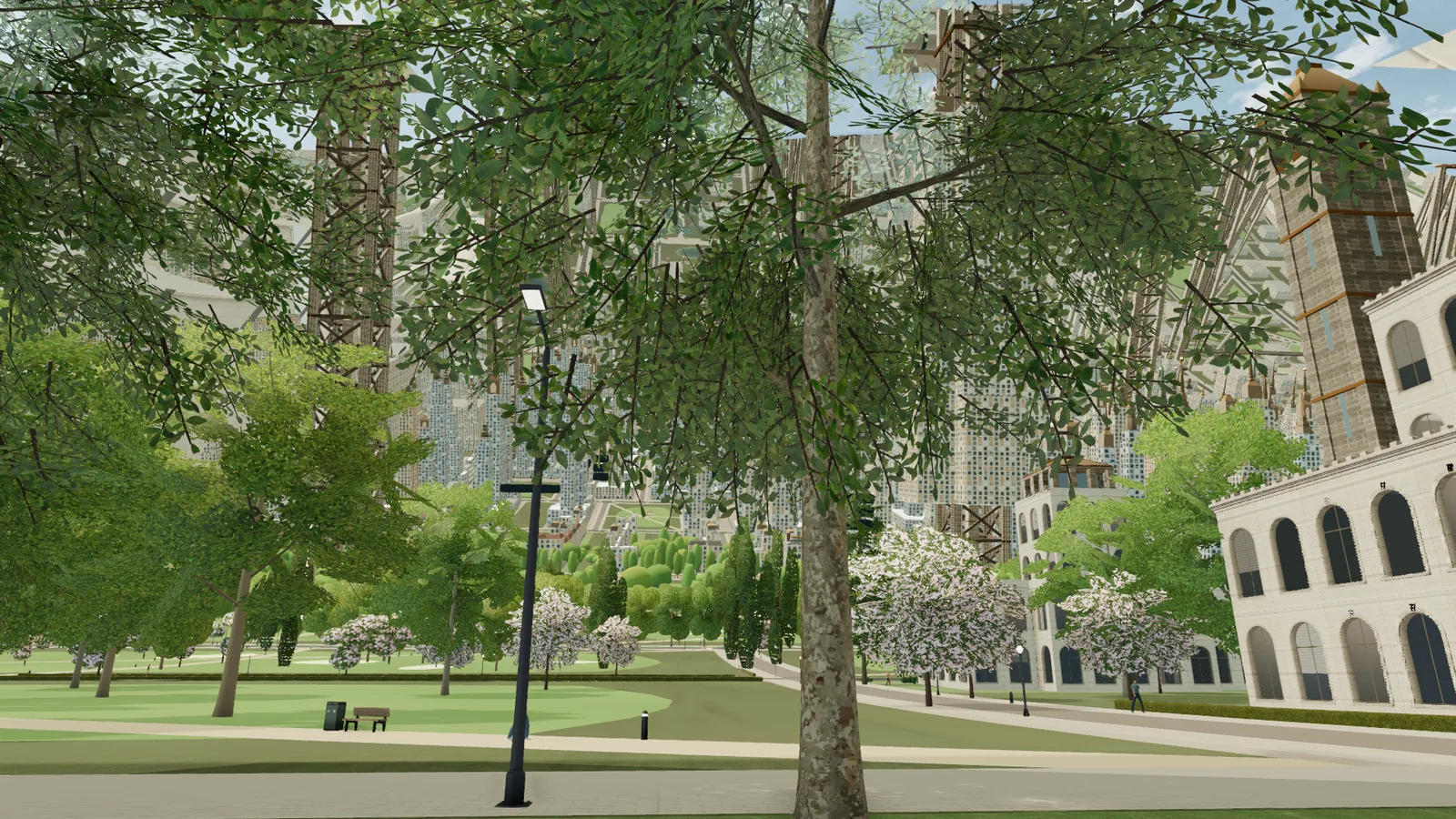 A cluster of crowned towers and spires with a lit landmark, seen across a park lawn at eye height.