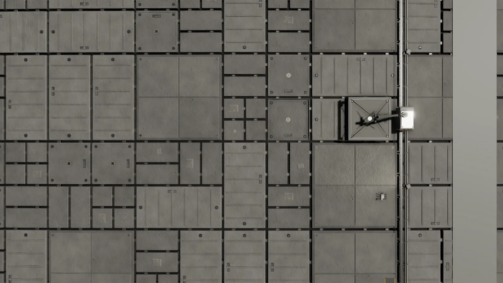 Close on the hull: shielding cassettes, repair seams, maintenance rails and a launch trench.