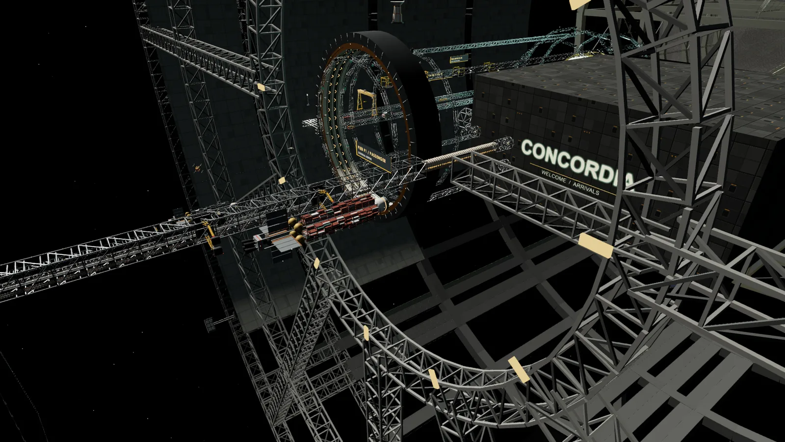A freighter berthed at a long truss pier on the outer face of the port, with tugs and the axial aperture nearby.