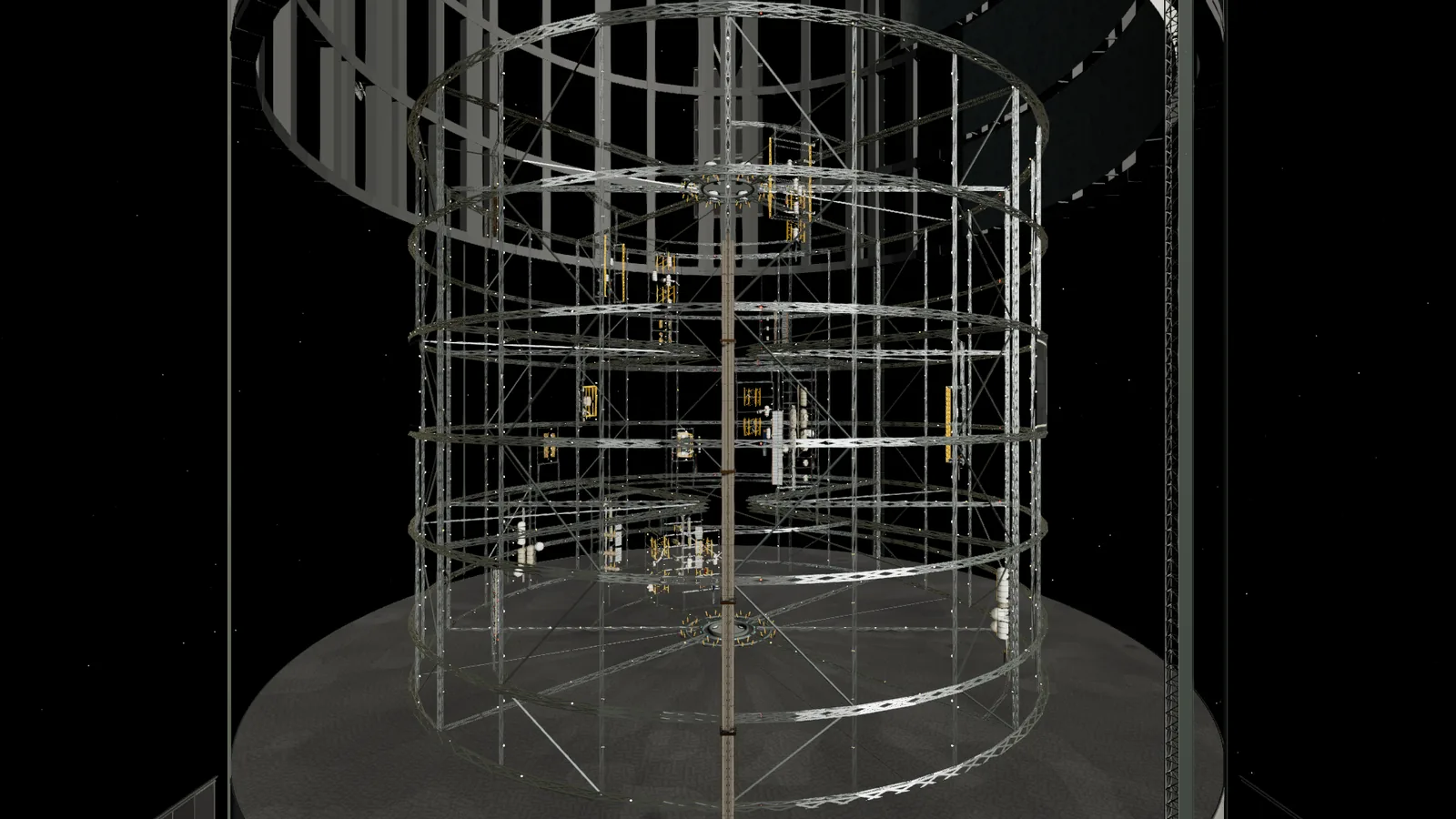 An open bay in a station shell revealing a rotating industrial truss with cargo and tanks.
