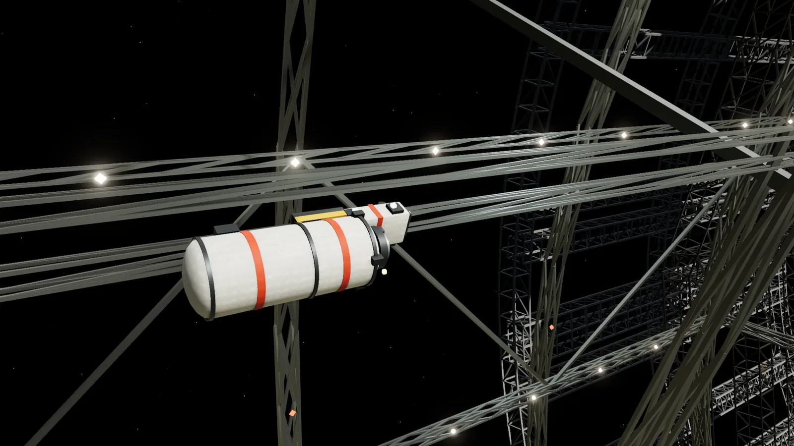 A cargo tug carrying a white pod with orange bands along a rail, with the lattice trusses of the industrial rotor around it.