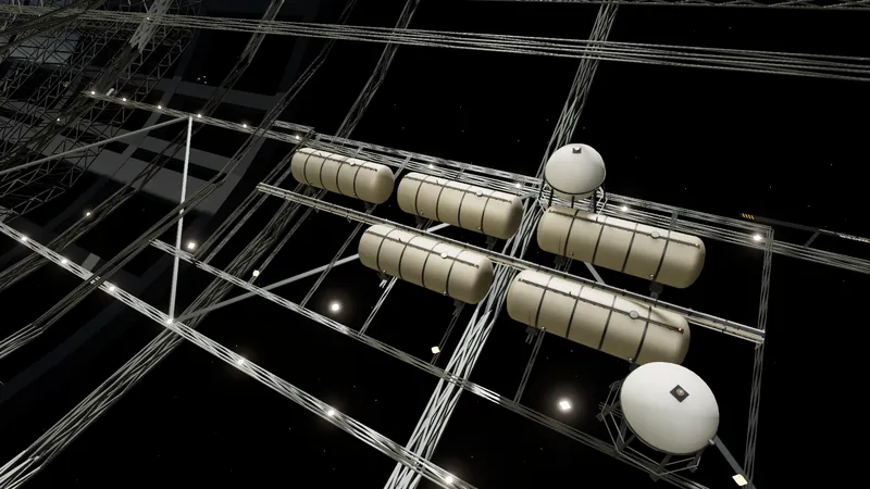 A tank farm of horizontal white vessels and spheres on a lattice deck inside the open truss of the industrial rotor.
