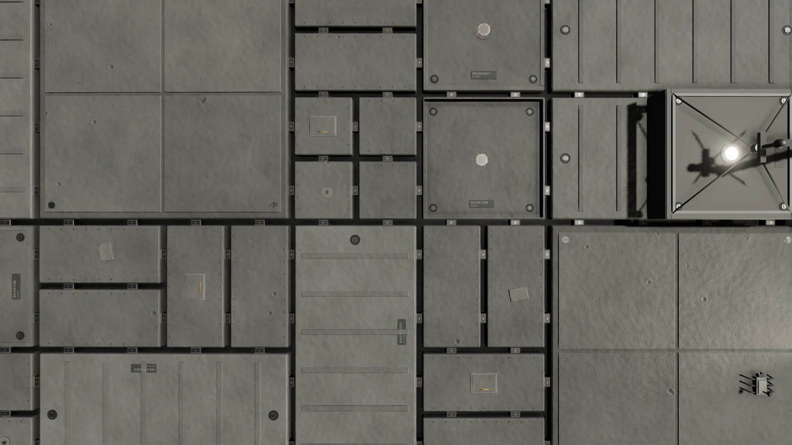 Close view of the hull's cartridge frames of compacted regolith, with repairs, a service rail, plumbing and serial markings.