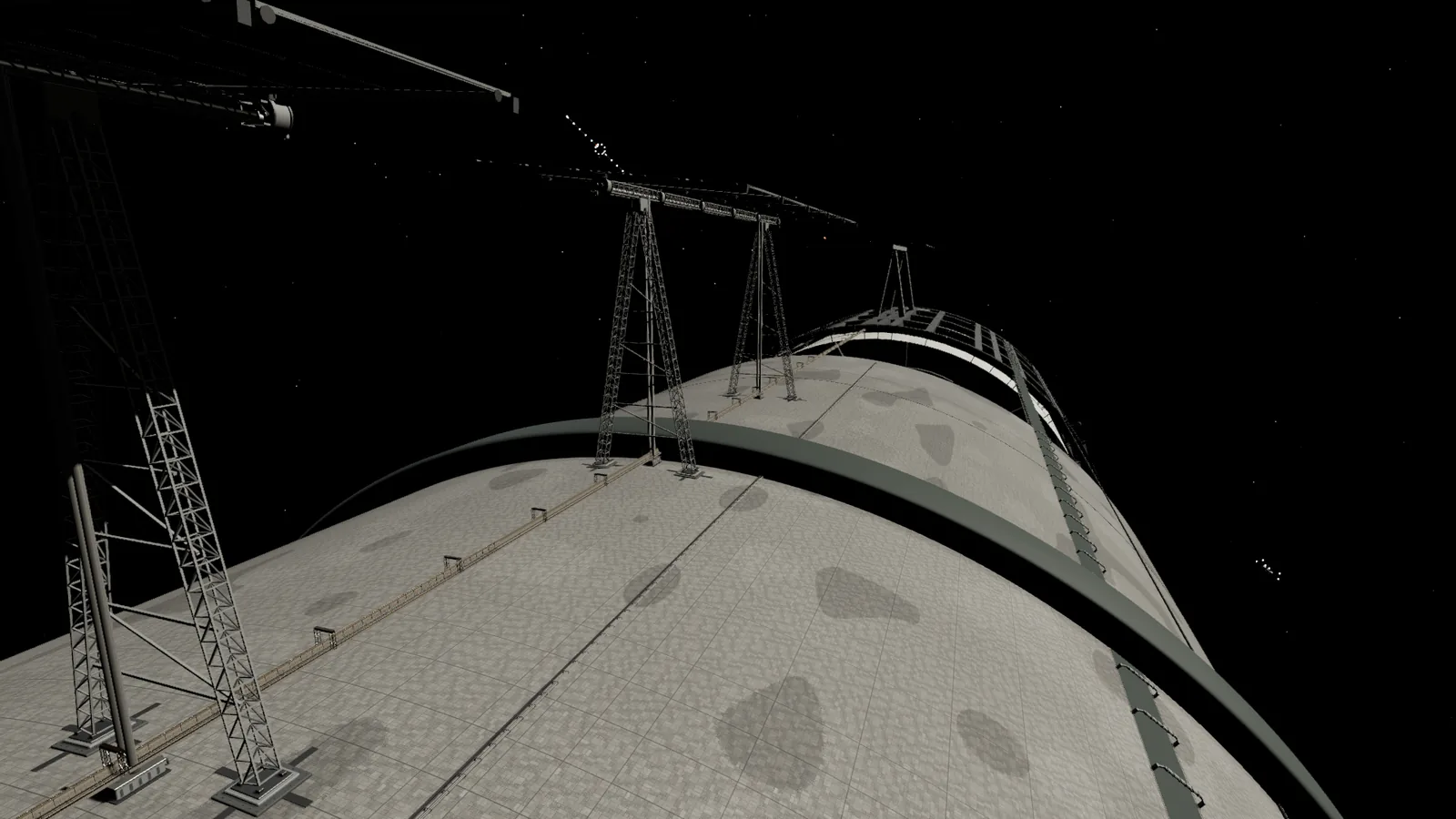 The electromagnetic launch track and its gantries running along the outside of the station hull.
