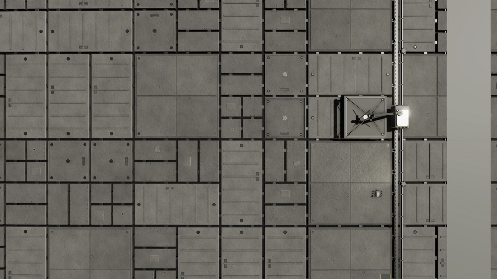 A close view of the station hull with shielding cassettes, repair seams, maintenance rails and a launch trench.