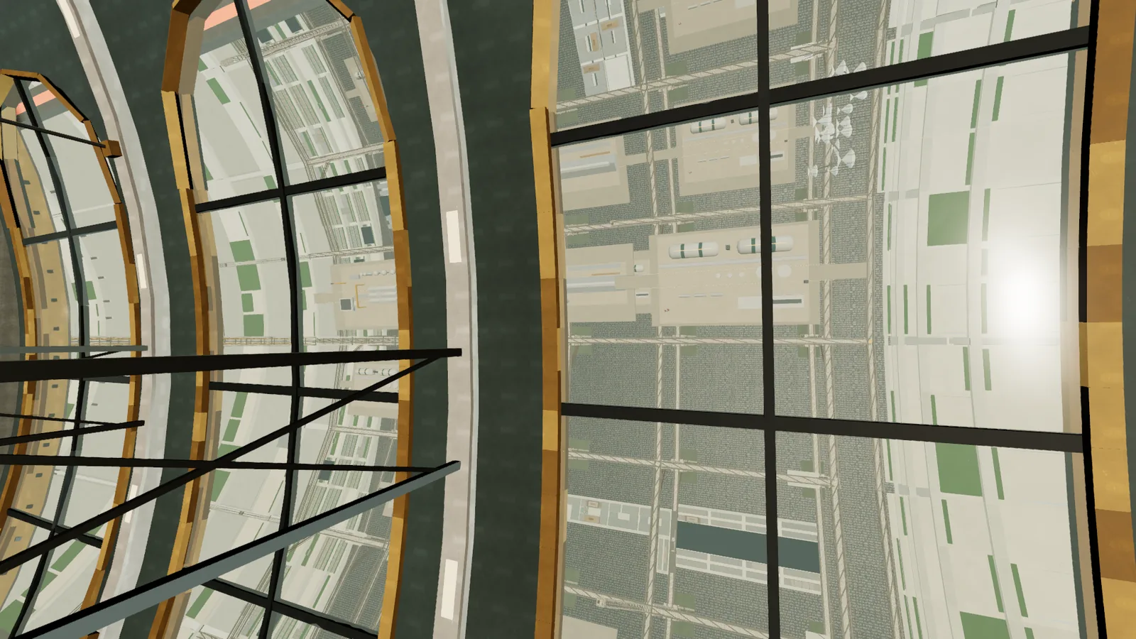 Looking out of the spine panoramic windows at the rotor wall turning past: ledges, plates and bronze window frames.